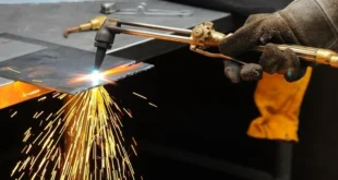 What is backfire in welding?