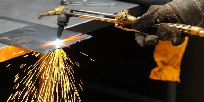 What is backfire in welding?